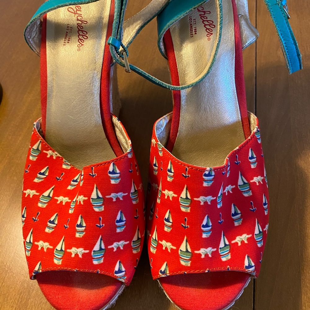 Seychelles red sailboat wedges